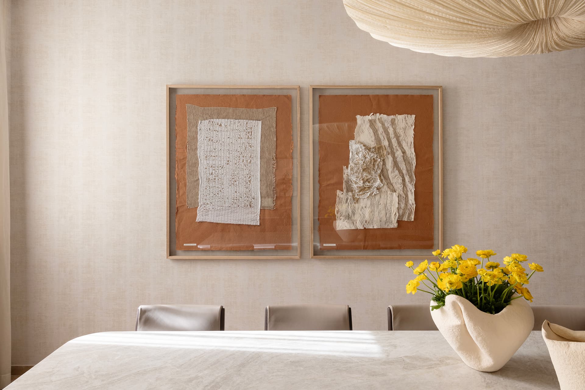Breakfast nook with banquette seating and warm textiles