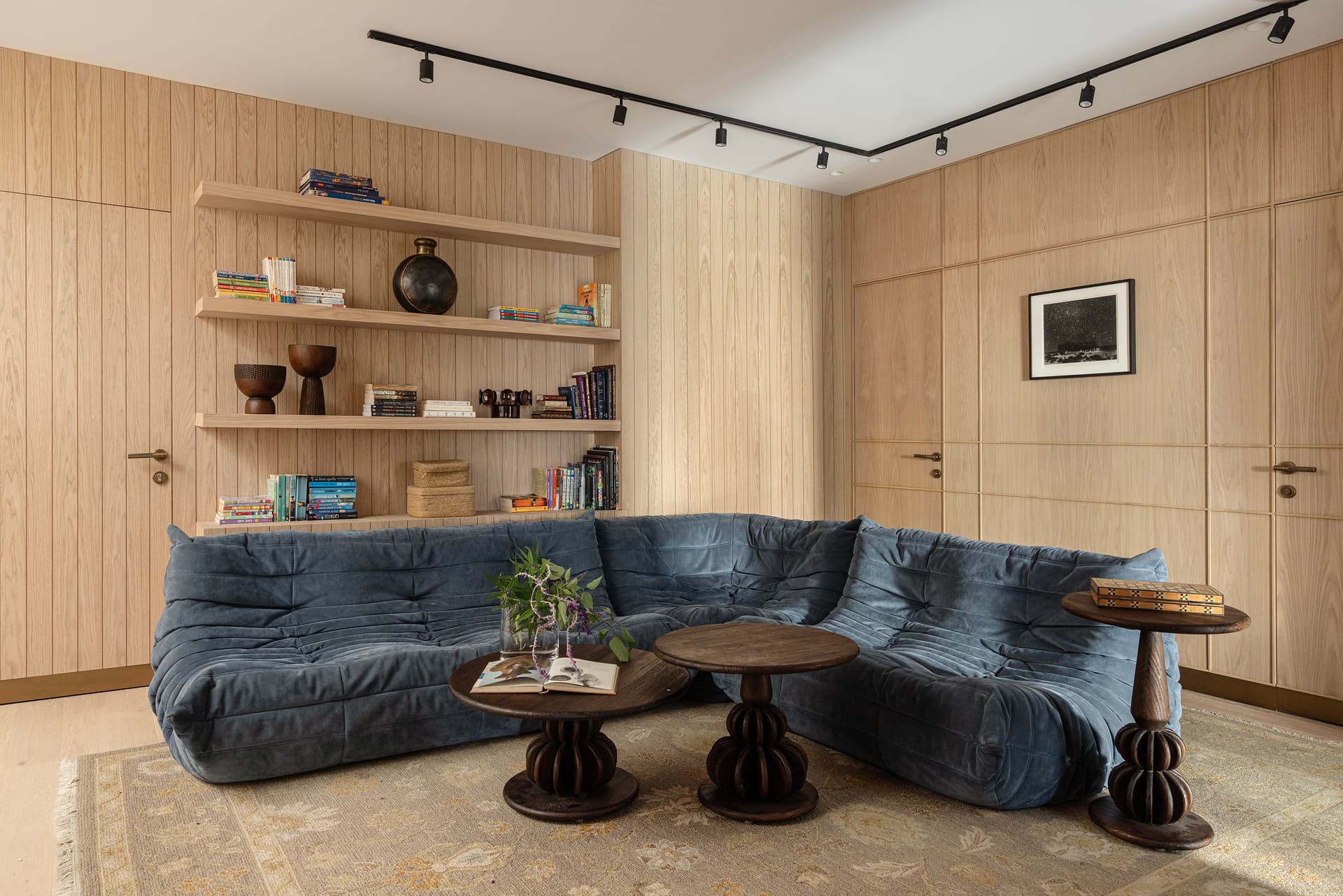 Sitting room with layered textiles and curated art